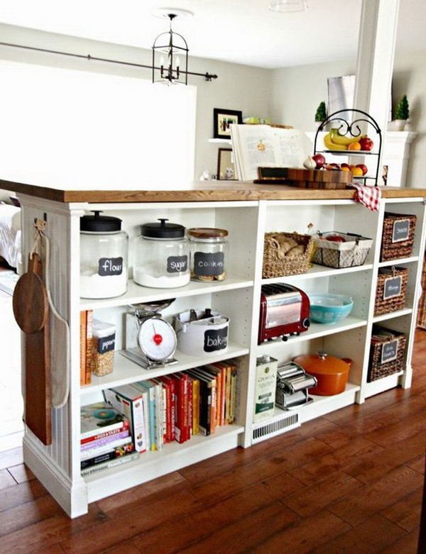 DIY Kitchen Island. This kitchen island is composed of an IKEA butcher block and three BILLY bookcases. You can also give the island a more custom look with moulding and beadboard on the side. See more details 