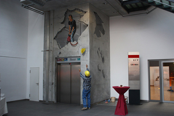 3D Street Art Treuhaus   Frankfurt. A real estate company was celebrating 25th anniversary of their object. The 3D artist worked on concrete in the atrium.