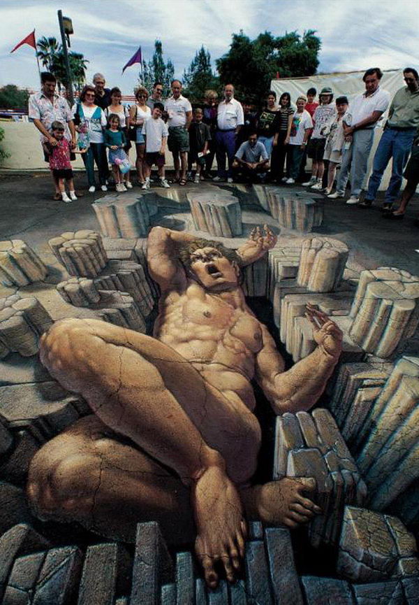 3D Street Art Relaxing giant. A huge giant relaxing on the street.