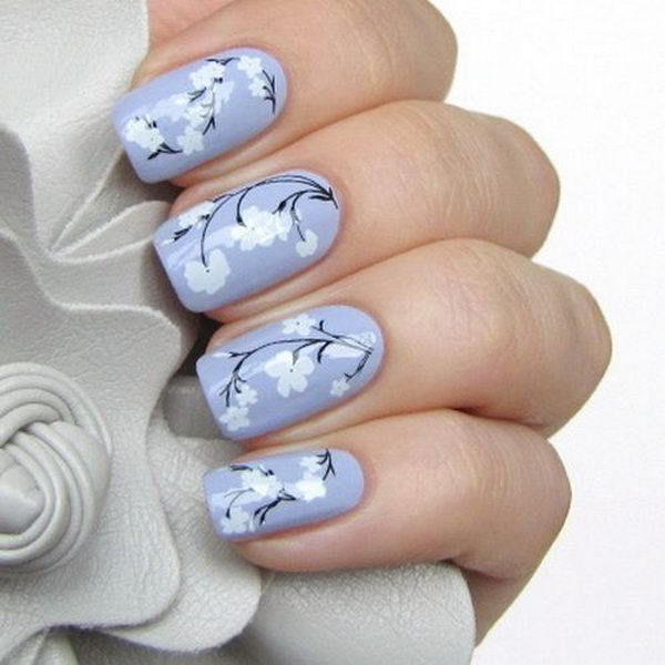 Pretty Flower Nail Art. These flower designs are so cute and make a regular manicure look like a piece of artwork. 