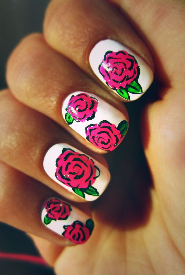 Pretty Flower Nail Art. These flower designs are so cute and make a regular manicure look like a piece of artwork. 
