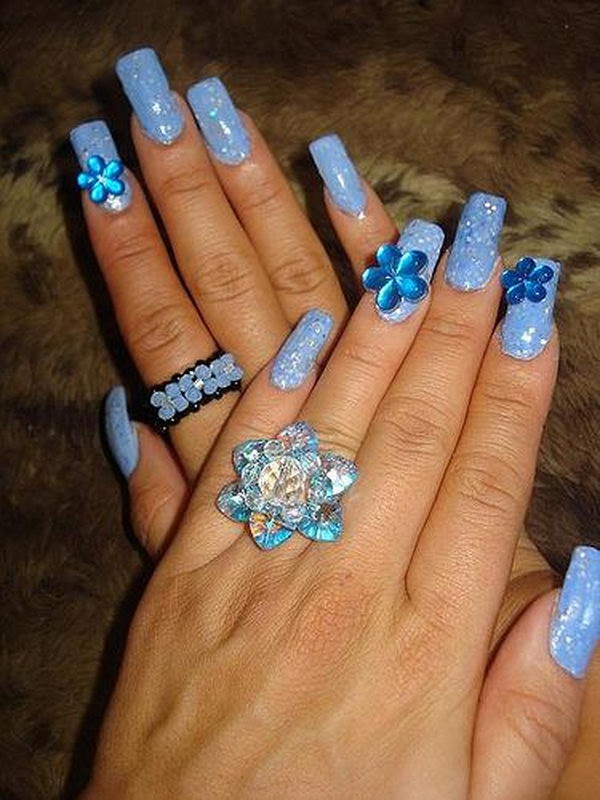 Pretty Flower Nail Art. These flower designs are so cute and make a regular manicure look like a piece of artwork. 