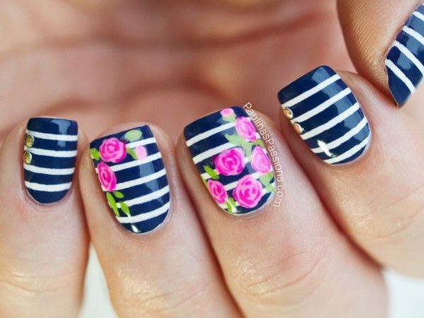Pretty Flower Nail Art. These flower designs are so cute and make a regular manicure look like a piece of artwork.