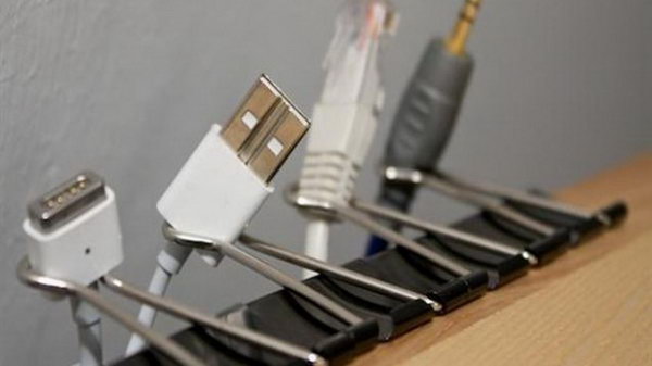 Keep Cords Easily Accessible with Binder Clips. Creatively organized home office boosts your mood and make you more productive.