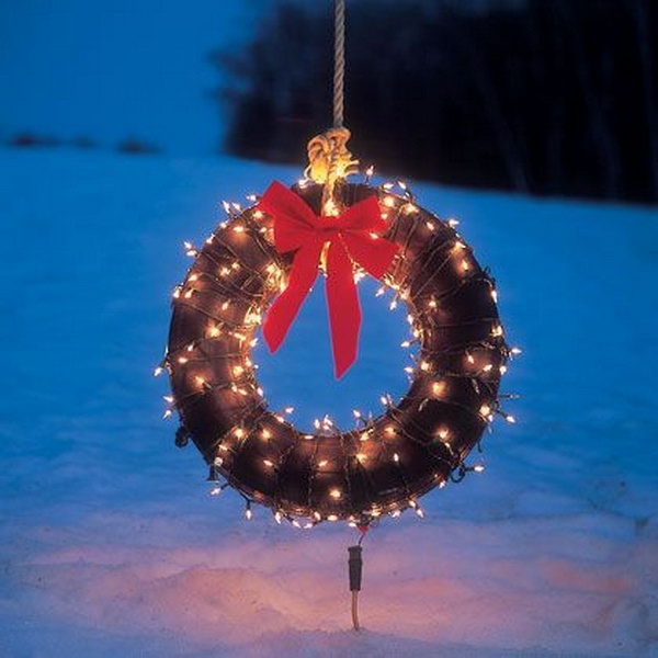 Outdoor holiday wreath from a tire.