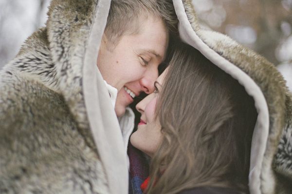 Choose winter engagement photos to capture the winter wonderland that awaits them outdoors. It is really romantic getting warm and cozy with your loved one.