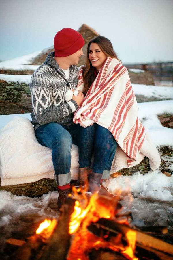 Choose winter engagement photos to capture the winter wonderland that awaits them outdoors. It is really romantic getting warm and cozy with your loved one.