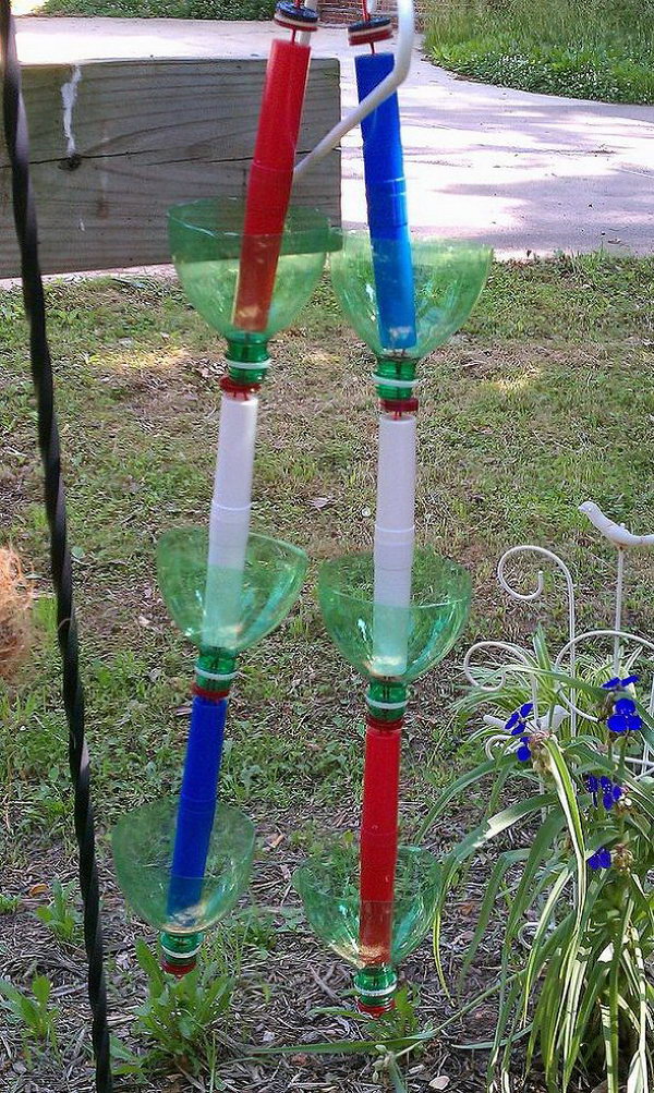 A hanging seedling rain chain made from recycled soda bottles. Not only make a good sound and enhance your house exterior appearance, but also divert water away from your house. 