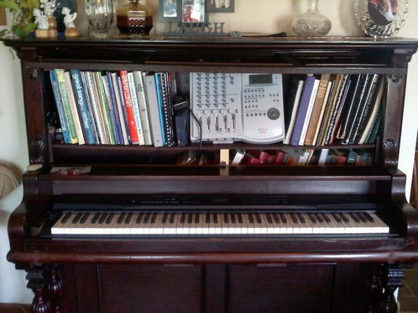 Creative Old Piano Repurposing Idea. Give your old piano a new life, and showcase your artwork to your friends.