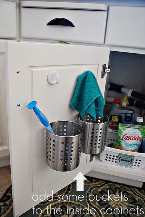 Buckets Over The Cabinet Door. Keep your sponges, brushes and pot scrapers sorted under the sink. Hide them out of sight while still giving them room to breathe and dry properly.