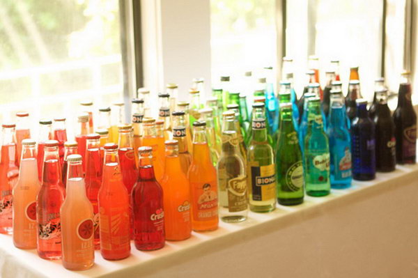 Classy Soda Bottle Drink Station. I really adore this beautiful and funny layout with a selection of soda bottles in bright colors. It's perfect to serve it to satisfy the taste of all ages.