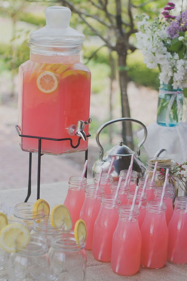 Romantic Pink Drinks for Engagement Party. Fill the large sized glass jar with pink juice. You can add lemonade slices for fresh flavor. You can turn on the tap to add you sweet and romantic engagement party drinks.