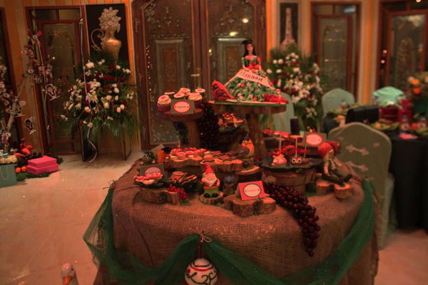 Woodland Graduation Party. This graduation party features the stunning cake with a beautiful girl in floral dress wearing a graduate’s cap at the top. The favors such as sun flower chocolates, chocolate eggs are sweet and adorable too.