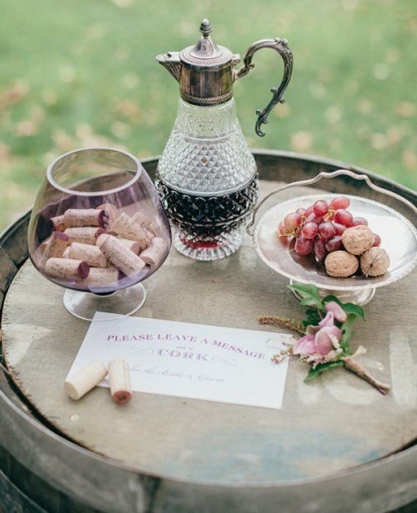 This Vineyard Cork Guest book is an easy way to get your guests leave quick notes or wishes during your reception. You can display the corks as a unique wall art for sweet memories.
