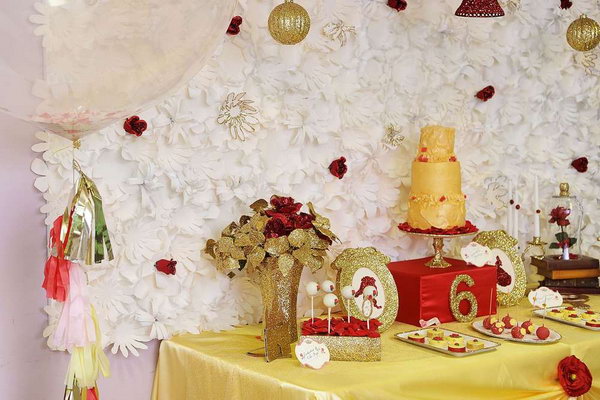 Enchanted Beauty and Beast Party. This beauty and the beast inspiration party consists of sweet desserts, enchanted rose cupcakes, stained glass cookies, cake pops with gold sugar, mini tea cookies. All the favors such as tiaras and wands boys finish off for the theme of this party. 