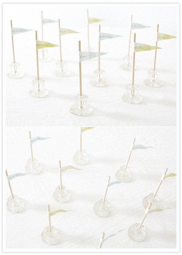 Drawer Knob Place Cards. If plants aren't your cup of tea, create this funny place holder with recycled drawer knobs for your glamorous wedding party decoration. Glue dowels together and stick into the knob. Place colorful flag tags with guests' names written.
