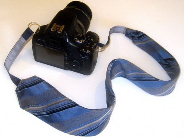 Old Necktie. Great idea. I love the idea recycling a necktie into a camera strap for Daddy very much. Learn how to do it here.
