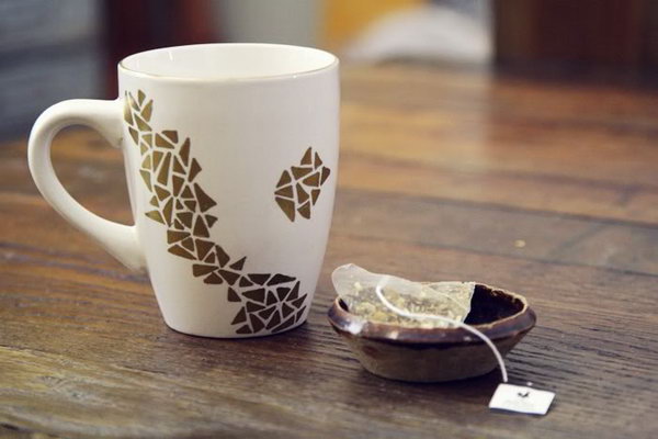 Dollar Store Geometric Decorated Mug. Give the plain white mug from the dollar store a new life by painting a geometric pattern. Of course, you can choose any pattern you like.