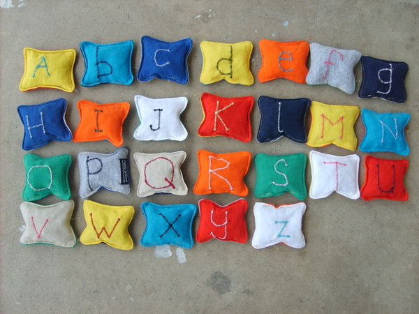Recycled T shirt Alphabet Beanbags. Make these fun and colorful alphabet beanbags by using old T shirt. Your little ones will love them very much, and it will also be easier and more fun to learn 26 letters for your kids.