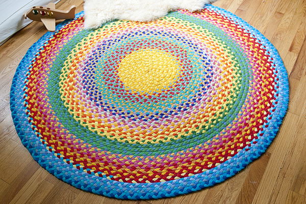 Braided Rainbow Rug with Old T shirt. This braided rainbow rug looks great in the play room.but it is not an easy project.If you have enough time and patience, you can have a try.