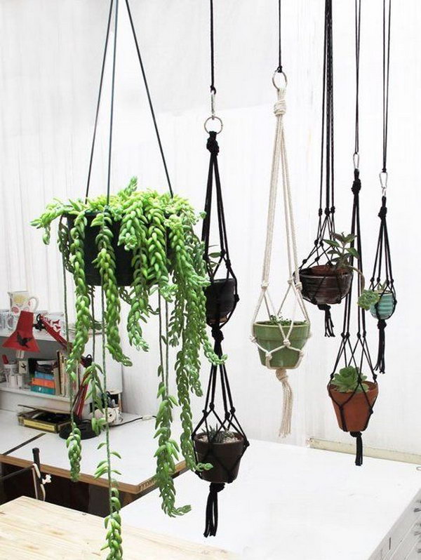 T shirt Plant Hanger. This is a really simple DIY project for any crafter all you need to be able to do is to twist and knot t shirt strips to make these cute hanging planters. Add your flower pot into the center pot a flower or plant hang on your deck or in your bedroom and enjoy!