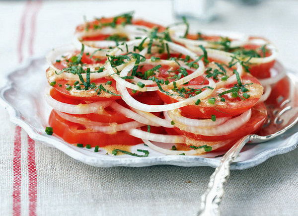 Creole Tomato Salad. Tomatoes are an important ingredient in the summer salad recipes. This simple no cook and composed salad  is easy to put together with  raw onion and vinaigrette. 