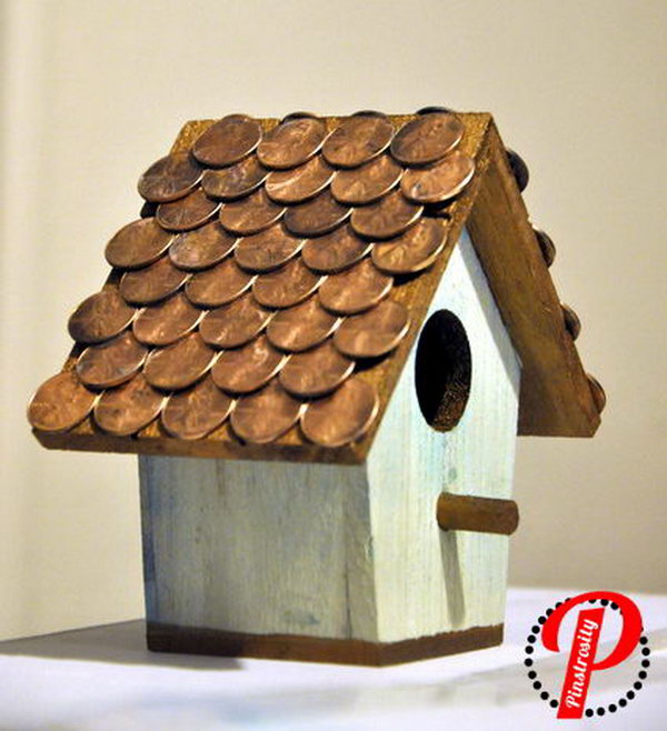 Penny Birdhouse. Enjoy watching birds outside of your kitchen window with this amazing DIY penny birdhouse. See how to do it