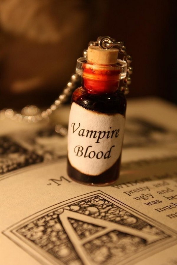 This easy Halloween craft was made from a big cork, empty nail polish bottle and a string. 