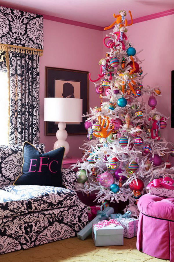 White Christmas Tree with Colorful Decorations. When considering which colour theme to use for your Christmas tree, look to your house's decorating style and colour.