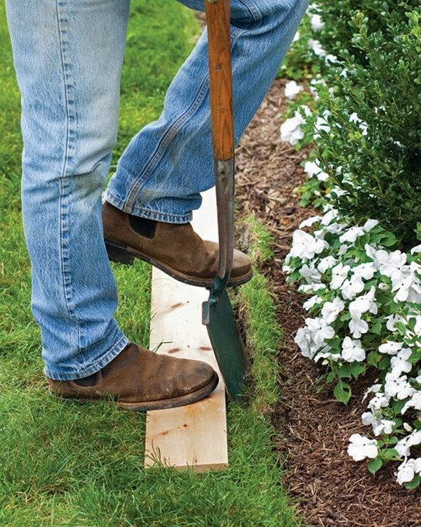 Use a Humble Plank of Wood in Any Size to Easily Edge a Lawn
