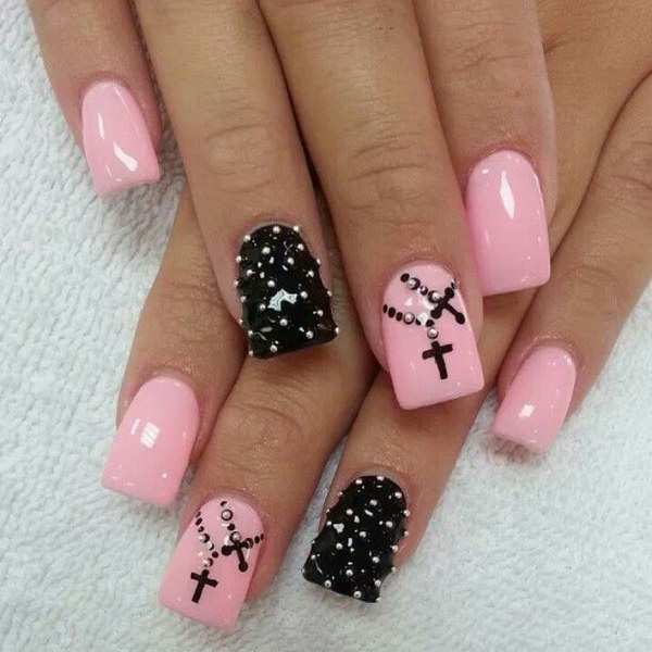 Pink and Black Stud Nails with Cross. 