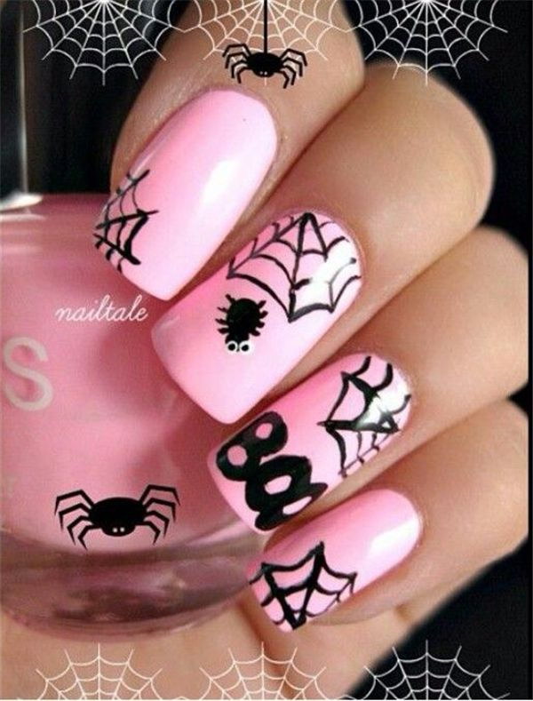 Manicura de Halloween con araña y telaraña.