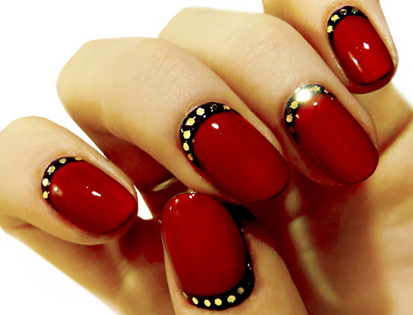 Red and Black Half Moon Nail Accented with Gold Details. 