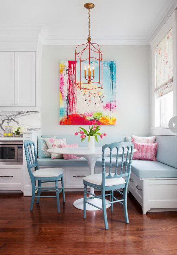 Beautiful Breakfast Nook With A Colorful Work of Art.