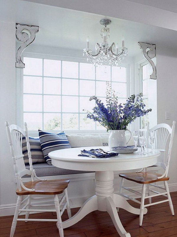 Breakfast Nook with a Window Seat and a Round Table.