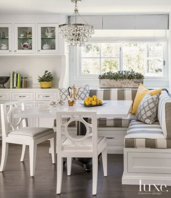 Transitional White Breakfast Nook with Striped Banquette Seating.