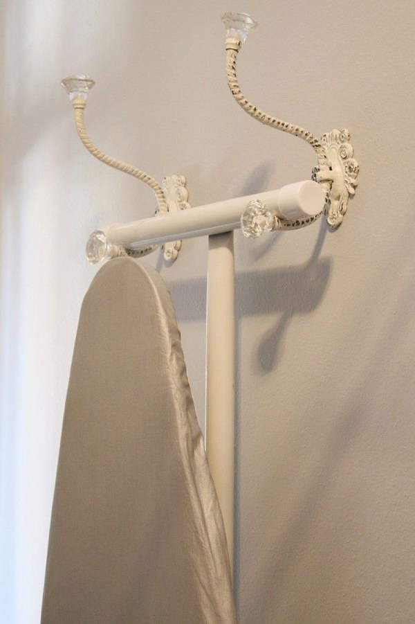 Get The Iron Board Off The Floor With Two Decorative Hooks 