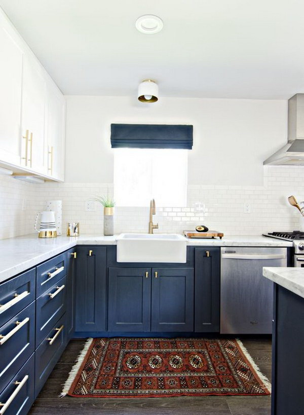 Navy Blue and White Kitchen Cabinets with Gold Hardware.