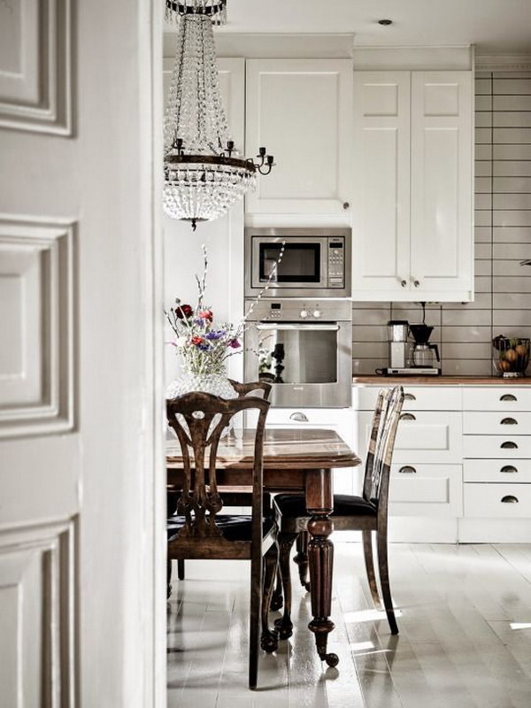 White Subway Tile Backsplash and Black Grout in a Classic White Grey and Black Kitchen