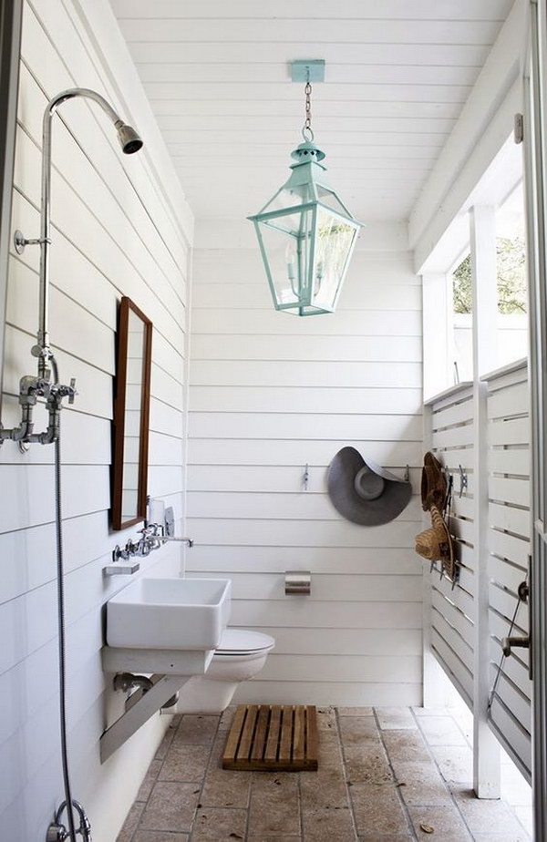 Farmhouse Outdoor Shower With a Turquoise Chandelier.