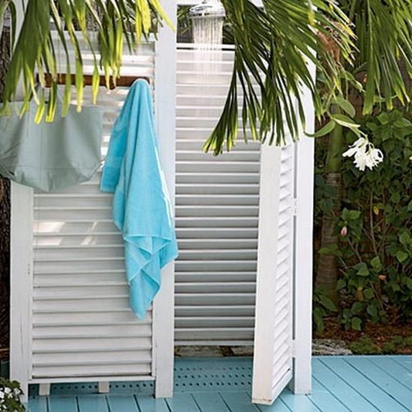 Outdoor shower with White Shutter Dividers Surround for Privacy.