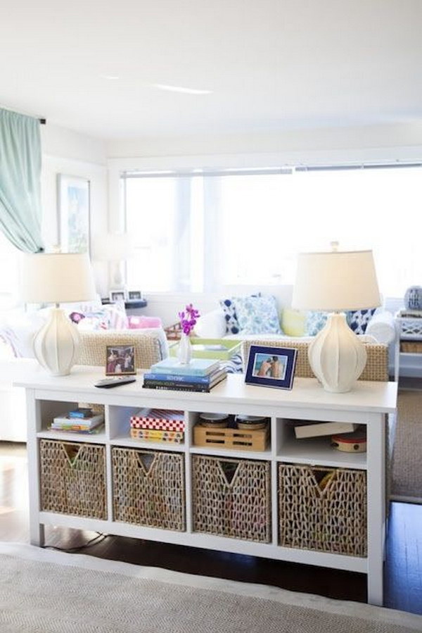 A Behind The Couch Furniture Piece is Great for Storing Things out of The Way in Your Living Room.