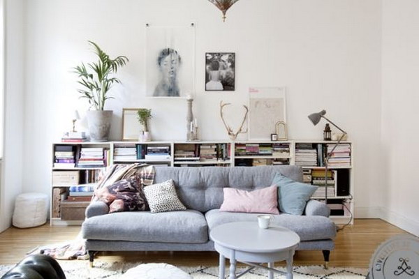 Small Bookcase Behind The Couch For Easy Access.