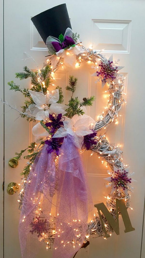 Create a Lighted Snowman Wreath Using 2 Grapevine Wreaths. 