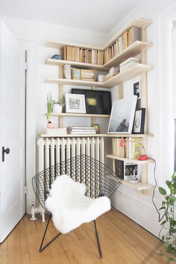 white corner bookshelf for nursery