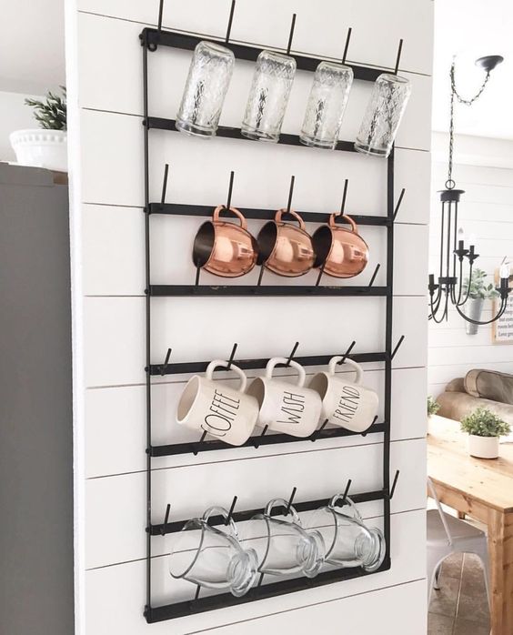 Black Metal Shelf With Hooks for Mugs.