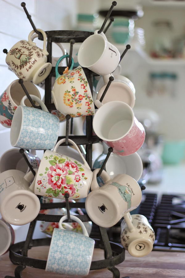 Metal Circular Rack That Holds All Of Your Coffee Cups.