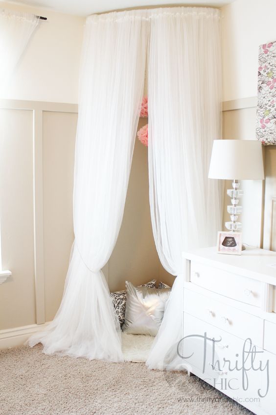 DIY Whimsical Canopy Tent or Reading Nook Made From Curved Curtain Rod And $4 Ikea Curtains.