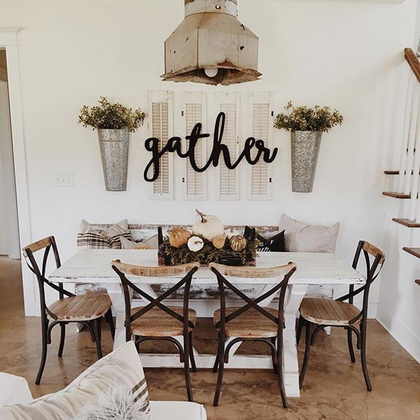 Repurposed Shutters Gather Sign with Galvanized Flower Buckets on the Wall.