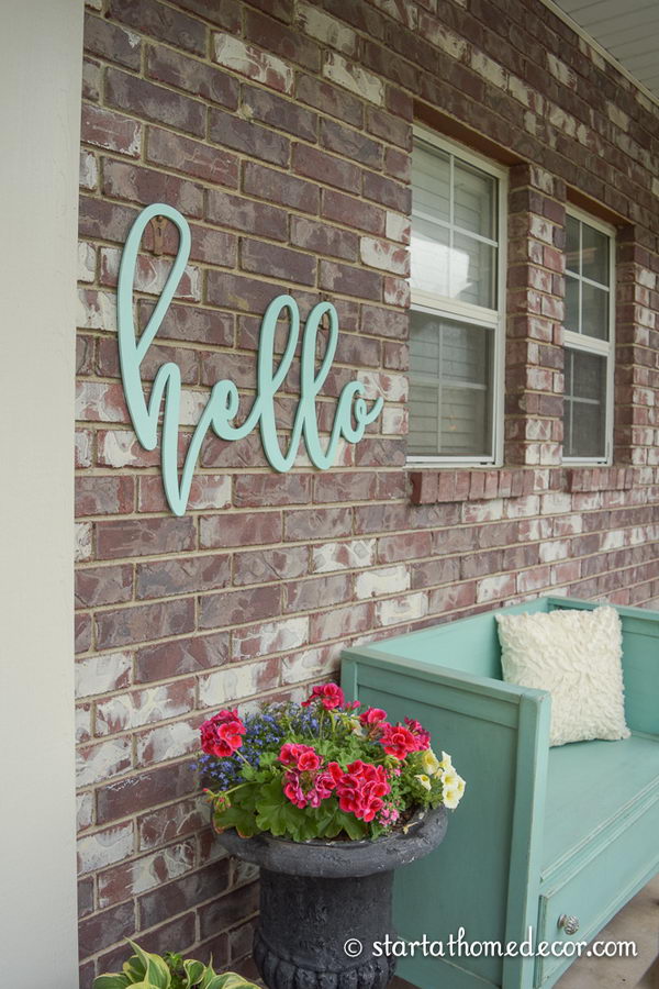 Add Character to Your Porch with a Simple Hello Welcome Sign.